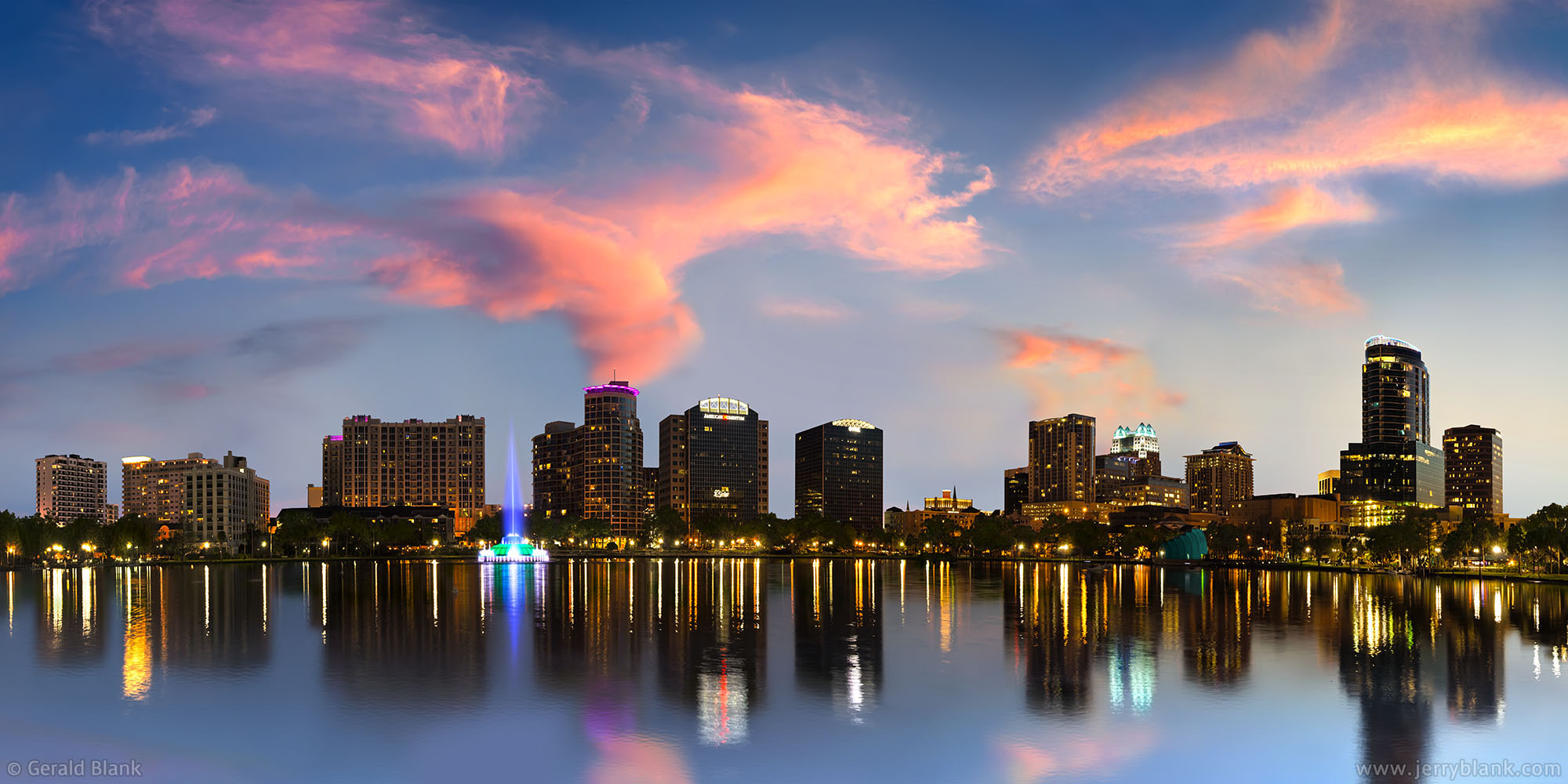 #14856 - Panoramic view of downtown Orlando, Florida at dusk, reflected in Lake Eola - photo by Jerry Blank