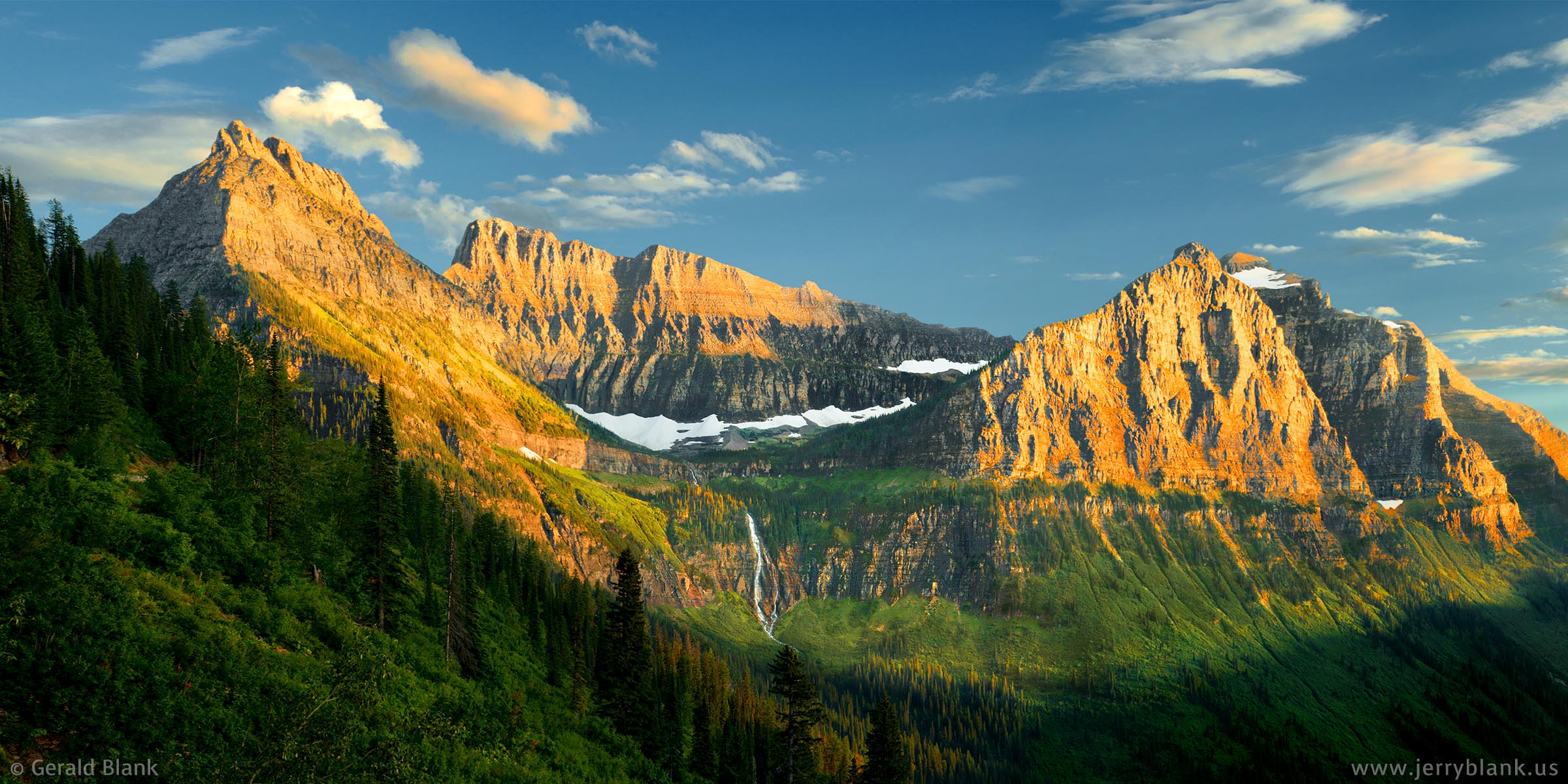 #26132 - The last rays of sunlight illuminate Mount Oberlin, Clements Mountain, Bird Woman Falls, and Mount Cannon, in Glacier National Park, Montana - photo by Jerry Blank