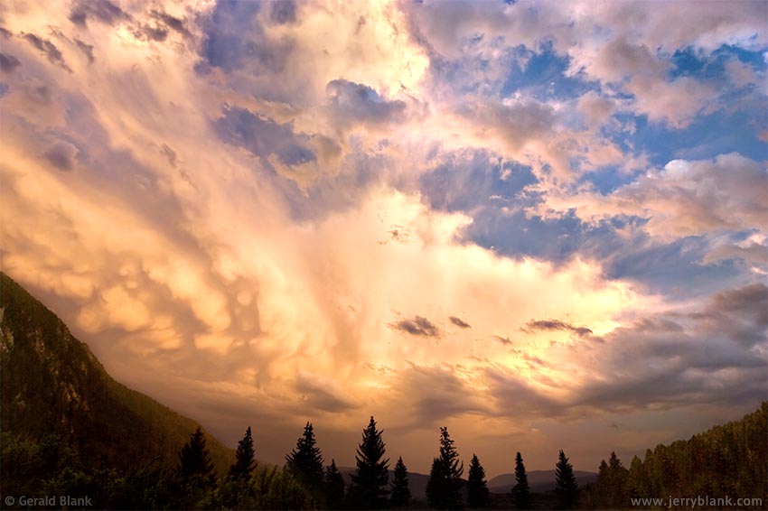 #06085 - Storm clouds dissipating over the Gallatin Canyon, near Soldier's Chapel, Big Sky, Montana - photo by Jerry Blank
