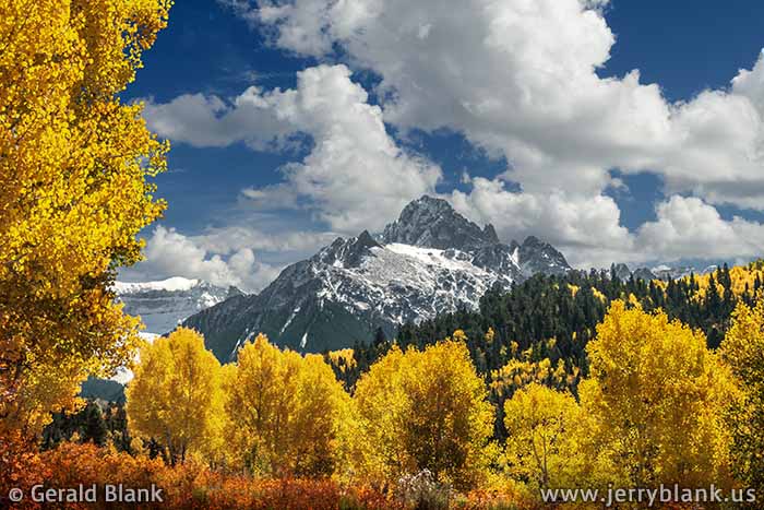 #06814 - Autumn foliage along Ouray County Road 7 frames Mount Sneffels, the highest peak in the Sneffels Range of Colorado’s San Juan Mountains