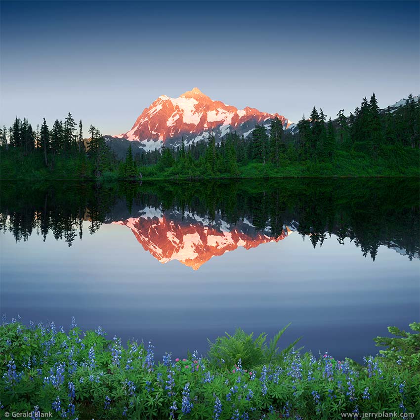 #35140 - The twilight alpenglow on Mount Shuksan is reflected in Highwood Lake, Washington, near the Mount Baker Scenic Highway